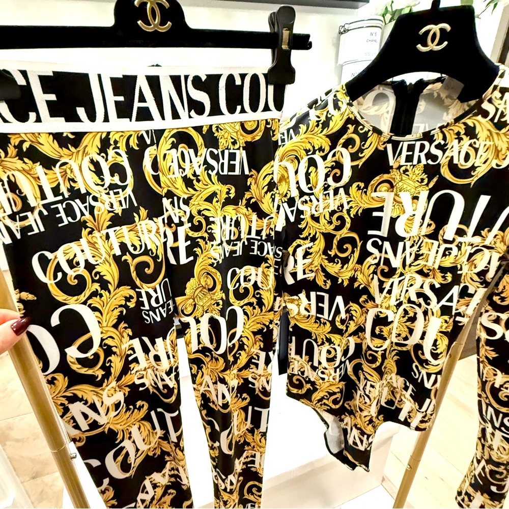 A Versace Couture two piece set- leggings in size 2 and bodysuit in size 4.